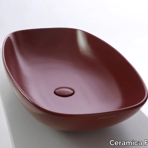 NUDASlim - Wall-mounted oval ceramic washbasin _ Ceramica Flaminia