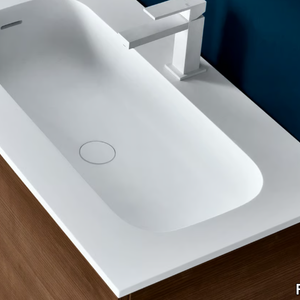 ROUND - Cristalplant® washbasin with integrated countertop _ FALPER