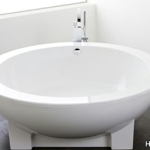 DREAMSCAPE - Freestanding round acrylic bathtub with chromotherapy _ Hoesch