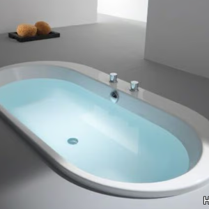 FOSTER - Oval built-in acrylic bathtub with chromotherapy _ Hoesch
