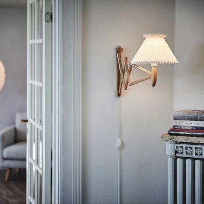 leklint224_sax_wall_lamp_lightoak_lampshade6_17_lifestyle3_c23caf85-3e1b-4b81-8f02-7693135cc75c.jpg
