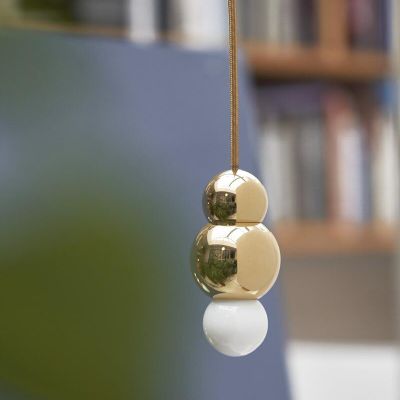 e8170c18-45f6-4dff-9b22-e0feea1c1c50_Ball+Light+F_Small_Brass_1_Michael+Anastassiades_photo+credit+Alexandros+Pissourios.jpg