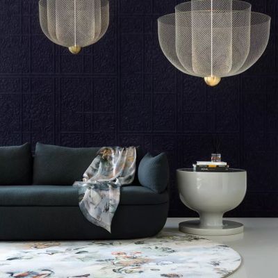 Moooi-memento-medley-carpet-ands-scarf-with-bart-sofa.webp