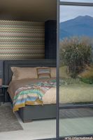 MissoniHomeWallcoverings04_Happy-Zig-Zag_10332_Roomshot_Web_HR-medium-two-thirds.jpg thumb image