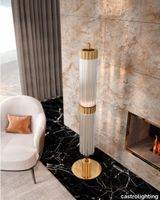 Castro-Lighting-Interiors-Arcade-Floor-Lamp-Sophisticated-Beauty-in-Brass-and-Glass-Details.jpg thumb image