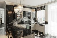 Opulent_Residence_in_Lithuania_black_marble_kitchen_feat_lotus_pendant.jpg thumb image