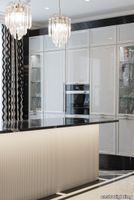Opulent_Residence_in_Lithuania_black_marble_kitchen_feat_lotus_pendant_side_vision.jpg thumb image