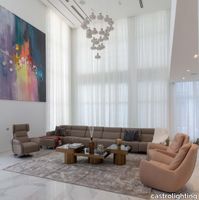 castro-lighting-luxury-ease-residential-home-design-in-nigeria-large-living-room-featuring-mystic-suspension-off.jpg thumb image