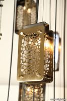 castro-lighting-safari-suspension-detail-gold-light-fixture-animal-pattern-2.jpg thumb image