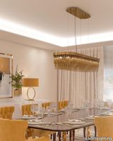 joao-fernandes-castro-lighting-streamline-suspension-gold-brass-yellow-tones-diningroom-Geres-edit.jpg thumb image