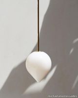 7c2f8074-531c-4194-b389-4ccb2f583e01_3-michaelanastassiades-bob-pendant-brass.jpg thumb image