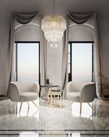 Castro-Lighting-Lotus-Suspension-Chiara-Armchair-Living-Room-in-Mykonos-pastels-hues.jpg thumb image