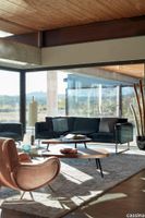 _charlotte-perriand_alluminio-metallo_verniciato_nero_legno_massel.jpg thumb image