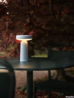 22956-en-ease-portable-lamp-light-blue-linear-steel-dark-green-cafe-table-o70-side-chair-muuto-org.tif thumb image