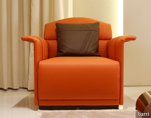 MADISON - Contemporary style upholstered leather armchair with armrests _ Turri