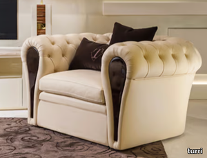 MAYFAIR - Tufted leather lobby chair with armrests _ Turri