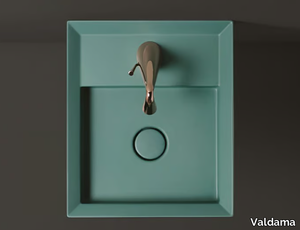 CUT - Countertop ceramic washbasin with hidden overflow _ Valdama