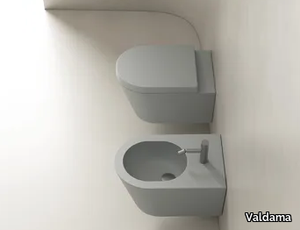 IL - Wall-hung rimless ceramic toilet _ Valdama