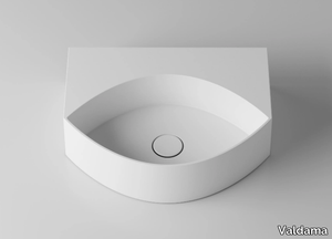 OCCHIO - Wall-mounted ceramic washbasin _ Valdama