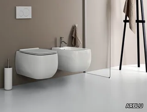 FLÒ - Wall-hung ceramic toilet _ ARBLU