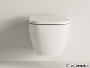 WUNDER - Wall-hung ceramic toilet _ Alice Ceramica