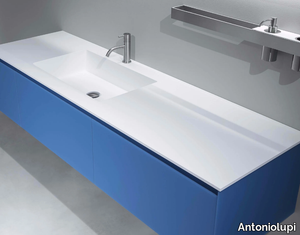 PODIO - Flumood® washbasin with integrated countertop _ Antoniolupi