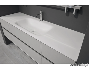 SEGNO - Corian® washbasin with integrated countertop _ Antoniolupi