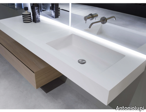 NIDO - Flumood® washbasin with integrated countertop _ Antoniolupi