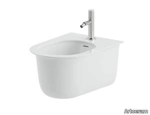 CHIC - Wall-hung ceramic bidet with overflow _ Artceram