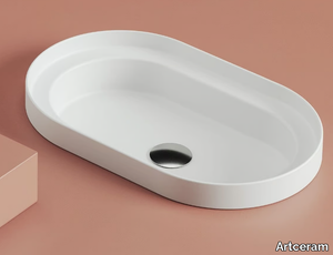 FUORI SCALA - Countertop oval ceramic washbasin _ Artceram