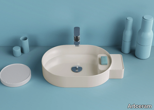 CARTESIO - Countertop oval ceramic washbasin _ Artceram