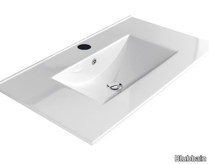 MOMA - Single porcelain washbasin with integrated countertop _ Blubbain