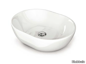 CALIT - Countertop oval ceramic washbasin _ Blubbain