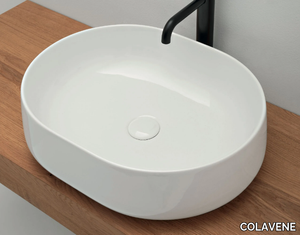 CIOTOLA - Oval countertop ceramic washbasin _ COLAVENE