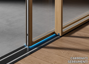 SKYLINE NØFORCE - Wooden lift and slide patio door with magnetic levitation _ CARMINATI SERRAMENTI