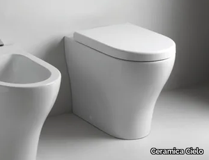 ENJOY - Floor mounted back to wall ceramic toilet _ Ceramica Cielo