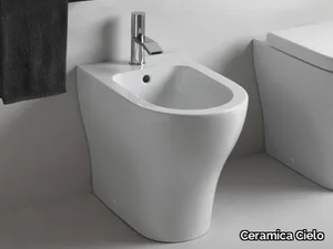 ENJOY - Floor mounted back to wall ceramic bidet with overflow _ Ceramica Cielo