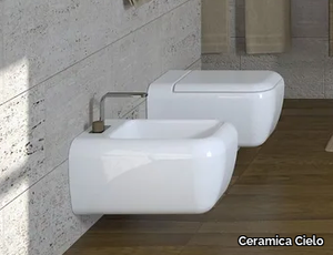 SHUI - Wall-hung ceramic toilet _ Ceramica Cielo