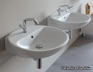 NUDA - Wall-mounted single ceramic washbasin _ Ceramica Flaminia