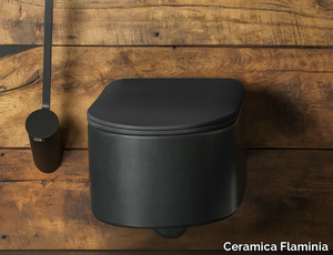 ASTRA - Wall-hung rimless ceramic toilet _ Ceramica Flaminia