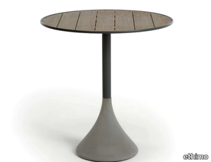 CONCRETO - Round teak garden table _ Ethimo