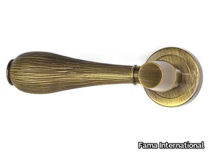 HARMONY - Brass door handle on rose _ Fama International