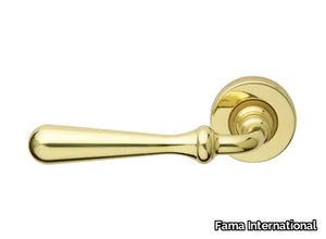 ITALIAN DESIGN - ARUM - Brass door handle on rose _ Fama International