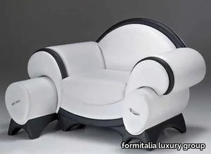 SUPRISMO - Upholstered armchair with footstool with armrests _ formitalia luxury group