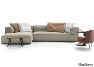 PERRY - Sectional fabric sofa with integrated magazine rack _ Flexform