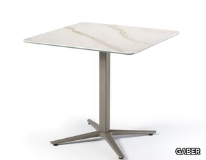 HUG PORCELAIN - Carrara marble table with 4-star base _ GABER