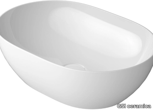 PURA 50X35 - Countertop oval single washbasin _ GSI ceramica