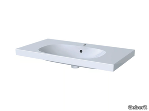 ACANTO - Porcelain stoneware washbasin with integrated countertop _ Geberit