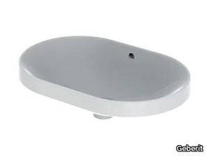 VARIFORM - Oval porcelain stoneware washbasin with overflow _ Geberit