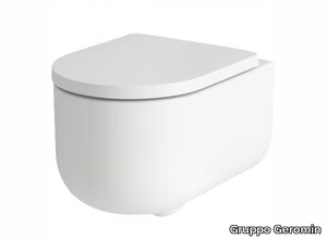 STINO - Wall-hung ceramic toilet _ Gruppo Geromin